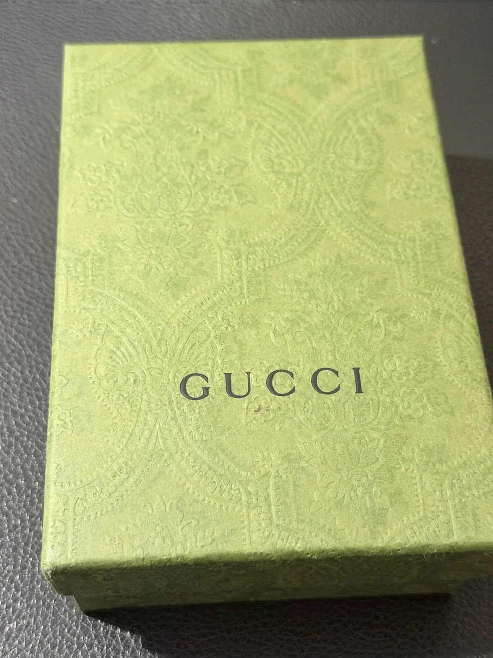 Gucci compact metallic